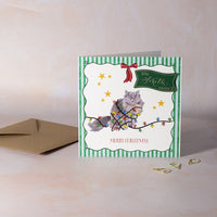 Personalised Christmas card with a cat illustration and festive design on a striped background