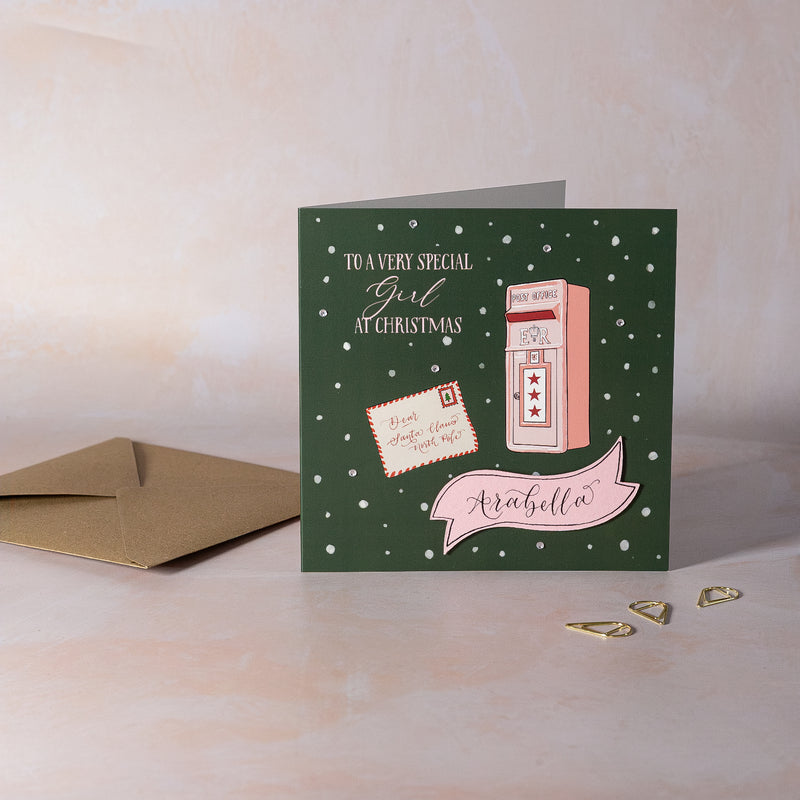 Personalised Christmas card with letter reading Dear Santa Claus and pink mailbox with personalised name.