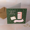 Christmas card with illustration of a mailbox and a letter to Santa with personalised name