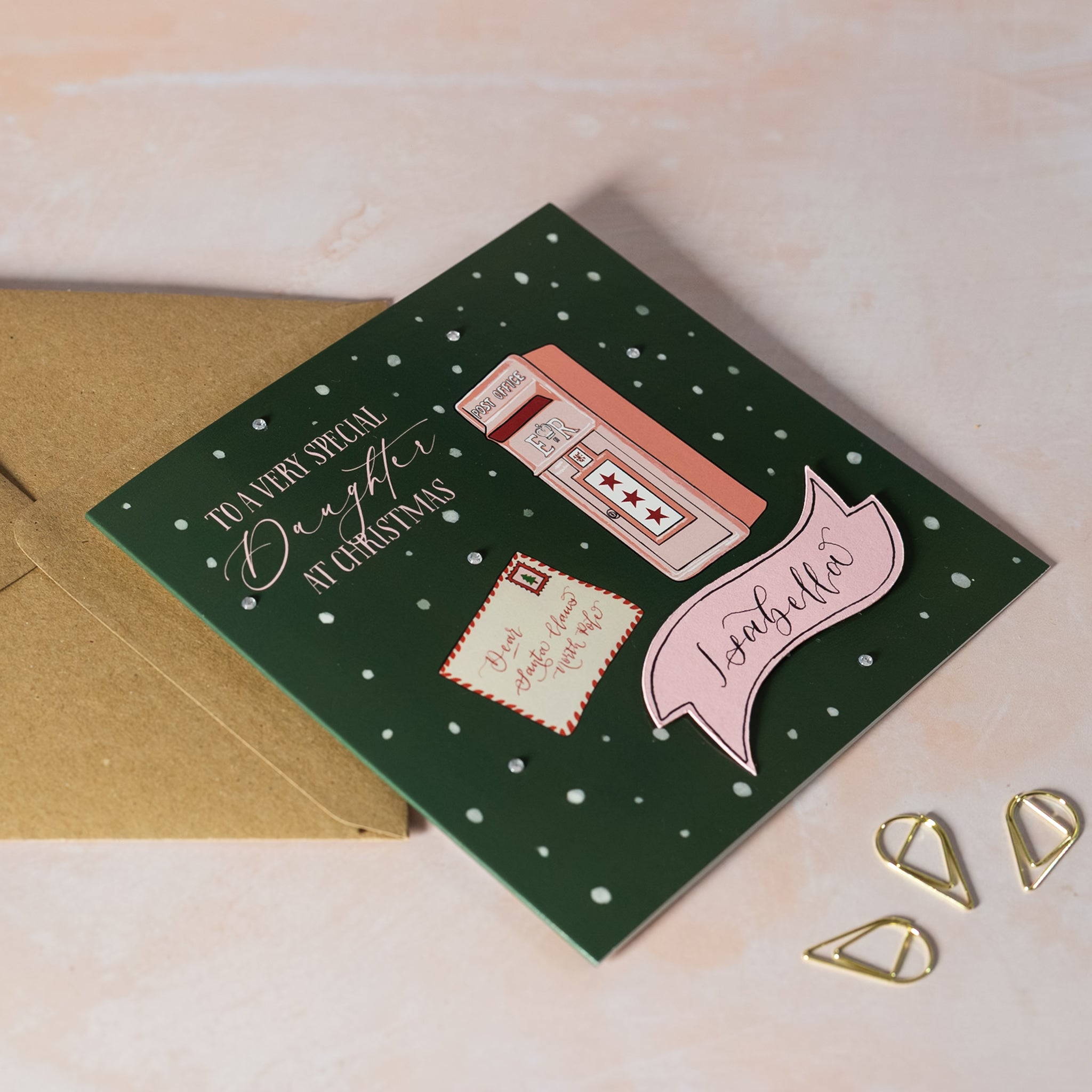 Personalised Green Christmas card with pink post box illustration and letter to Santa Claus with name on pink card