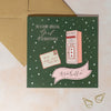 Personalised Christmas card with a pink mailbox and letter to Santa on a green background