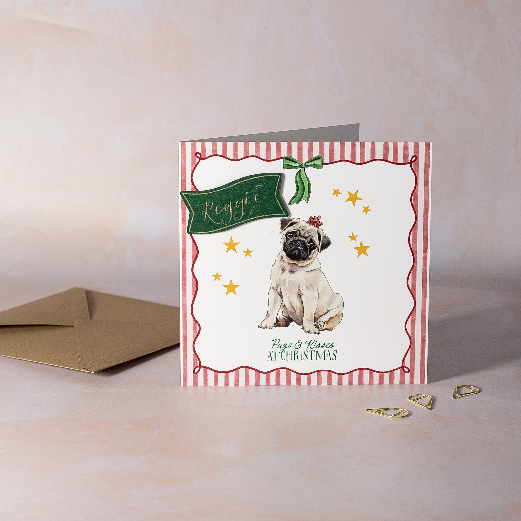 Christmas card with a pug illustration and personalised calligraphy name