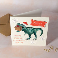 Dinosaur Christmas card with text 'Wishing a special boy a roarsome Christmas'