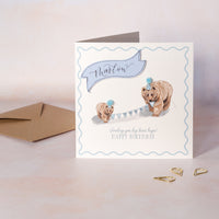 Kids Birthday card with two bears holding a banner and an envelope on a light background
